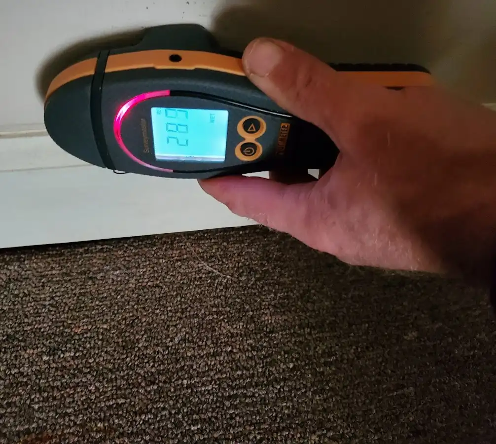 Moisture detection at baseboard during Storm Damage Restoration in Coventry
